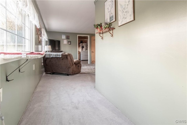 hall with light carpet