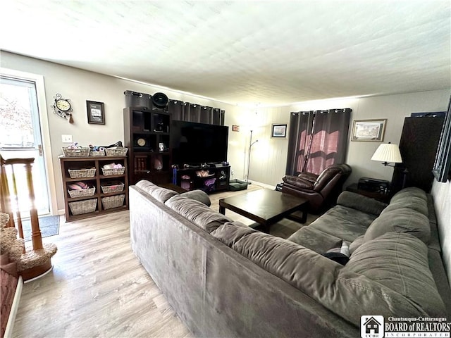 living area with light wood-style flooring