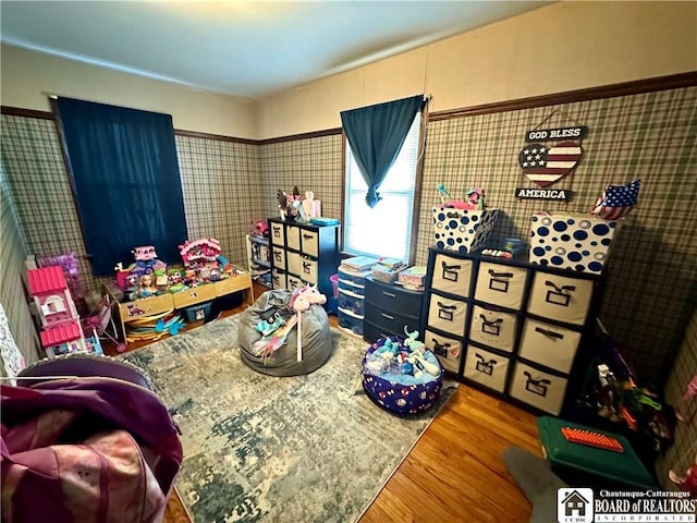 bedroom featuring wood finished floors