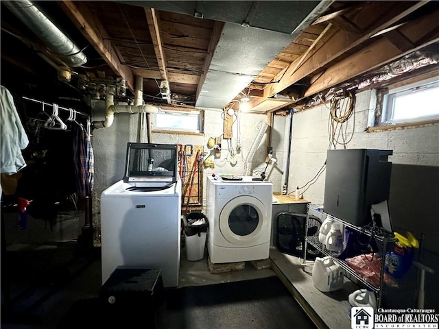 laundry area featuring laundry area and independent washer and dryer