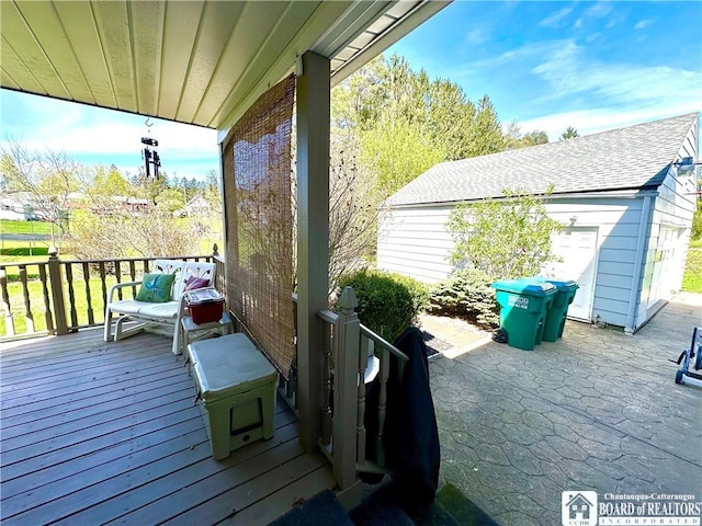 wooden deck with a patio area