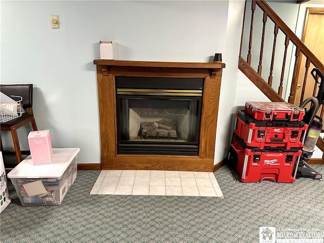 room details featuring baseboards and carpet flooring