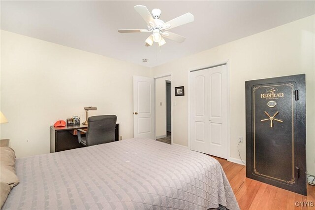 2203 State Route 90th Rd, Ledyard, NY 13026 - bedroom featuring light wood-style floors, a closet, ceiling fan, and baseboards