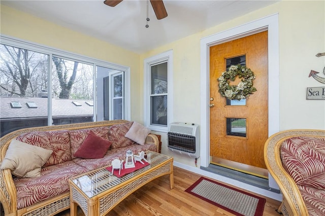 sunroom with heating unit