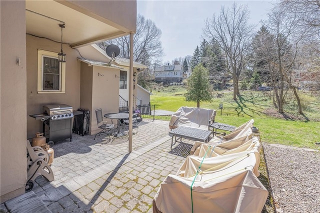 view of patio / terrace with outdoor lounge area and a grill