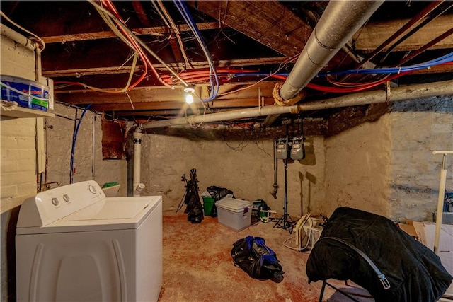 unfinished basement with washer / dryer