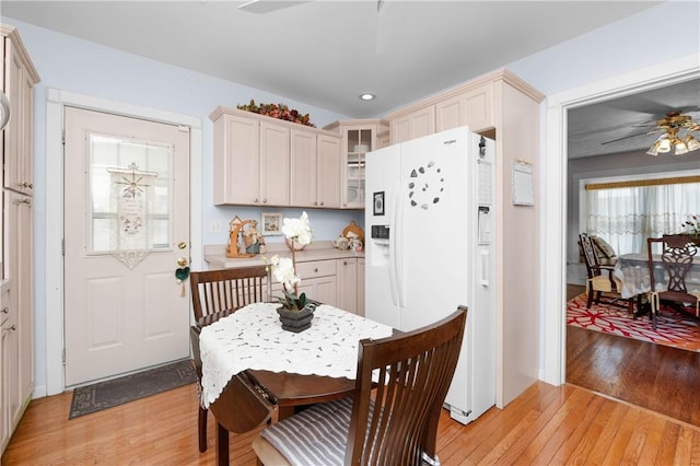 dining space with light wood-style floors, recessed lighting, baseboards, and ceiling fan