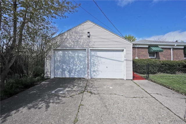 detached garage with fence