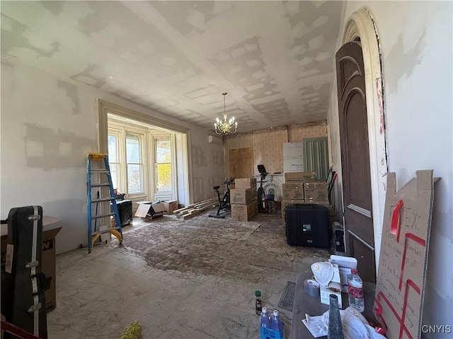 misc room with an inviting chandelier