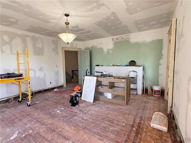 miscellaneous room with wood-type flooring