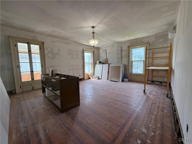118 E 3rd St, Oswego, NY 13126 - home office featuring wood finished floors, healthy amount of natural light, and french doors