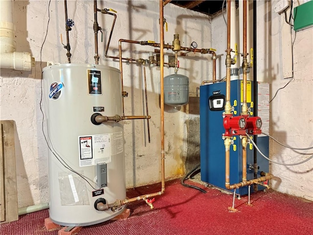 utilities featuring water heater and a heating unit