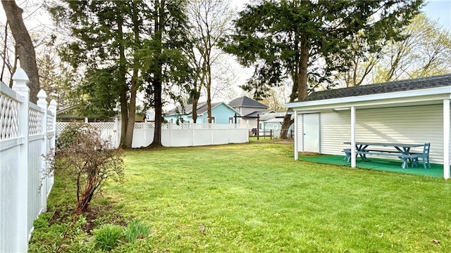 view of yard featuring fence