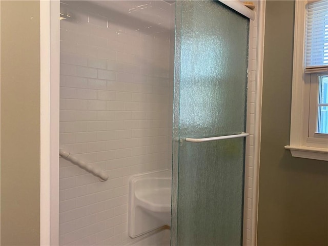 bathroom featuring a stall shower