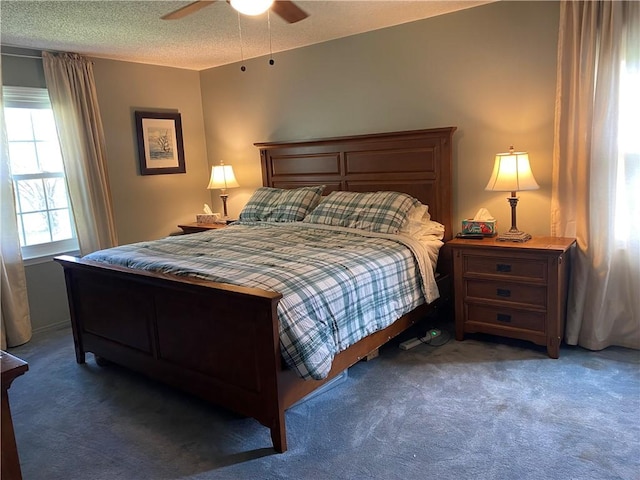 bedroom with carpet floors and a ceiling fan