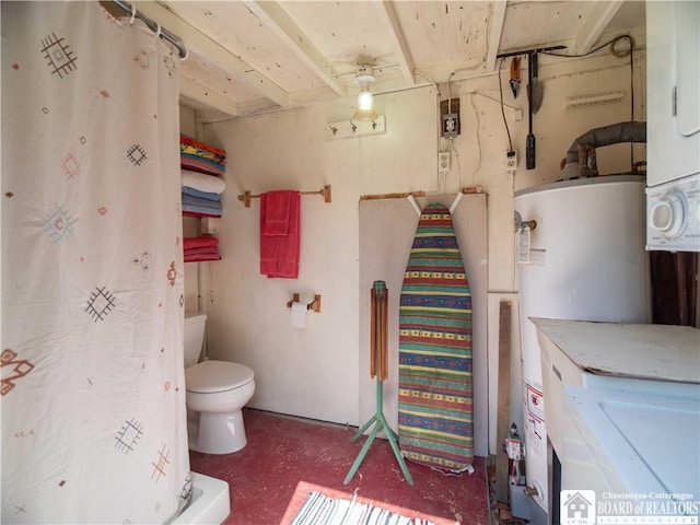 bathroom featuring water heater, toilet, and a shower with shower curtain