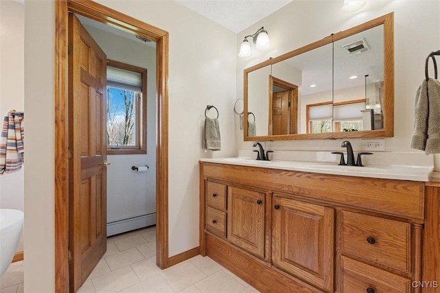 full bathroom featuring tile patterned flooring, double vanity, baseboards, a baseboard radiator, and visible vents
