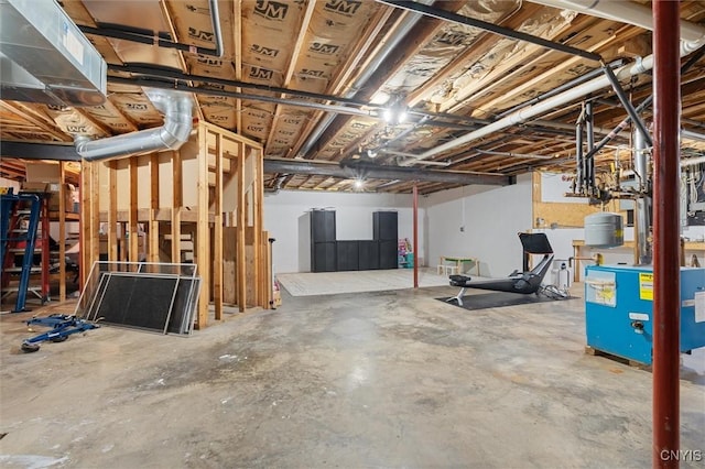 unfinished basement with a heating unit
