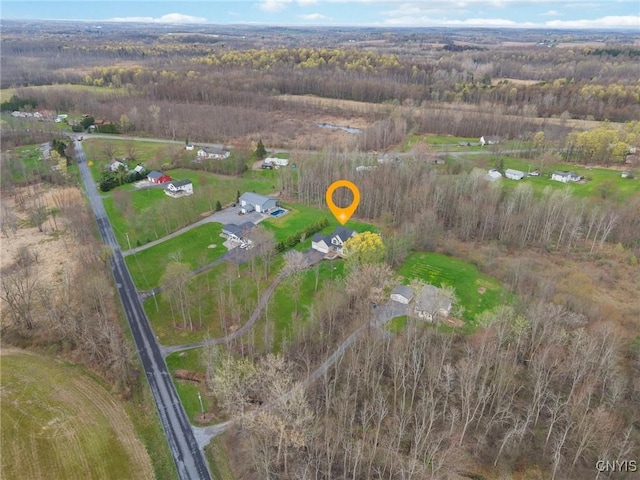 bird's eye view featuring a view of trees