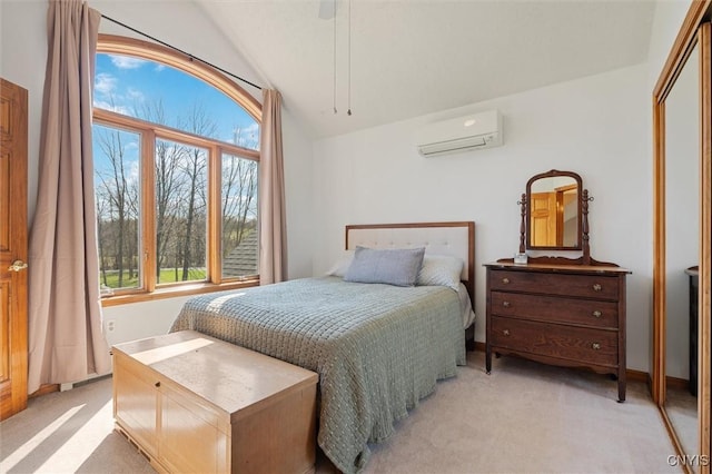 bedroom with multiple windows, light colored carpet, a wall mounted air conditioner, and lofted ceiling