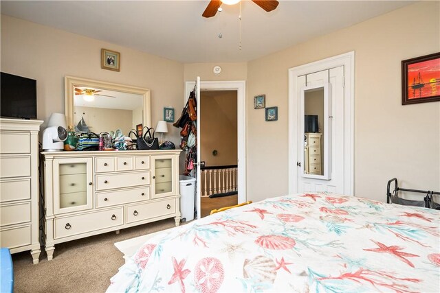 bedroom featuring carpet flooring and a ceiling fan