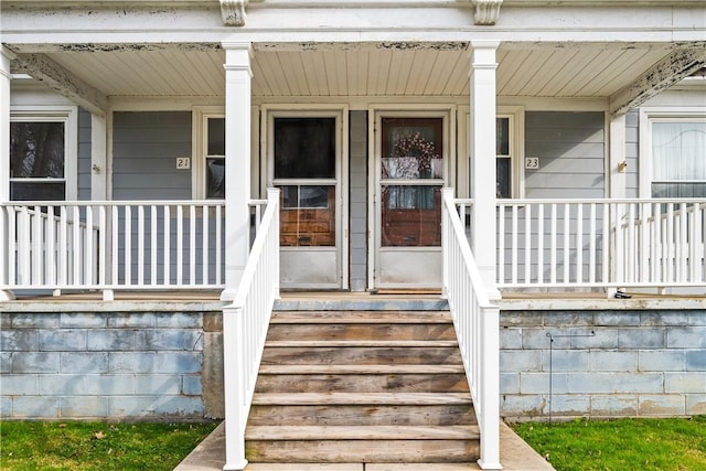 entrance to property with covered porch