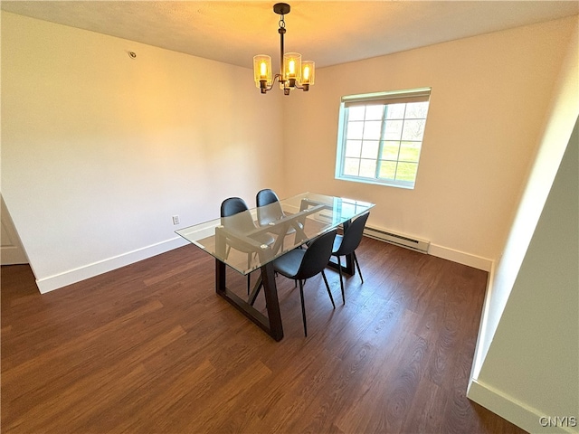 dining area featuring baseboards, a baseboard heating unit, dark wood-style floors, and a chandelier