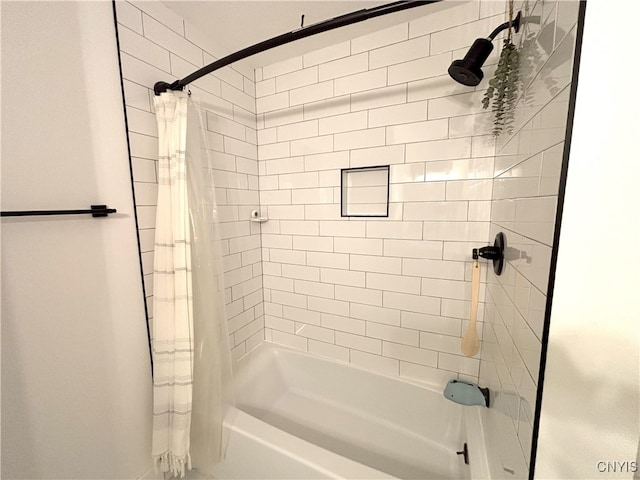 full bath featuring shower / tub combo with curtain