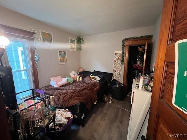 bedroom featuring wood finished floors