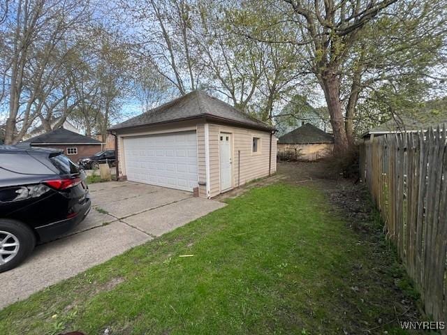 detached garage with fence