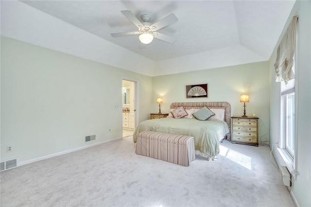 bedroom featuring visible vents, carpet flooring, and multiple windows