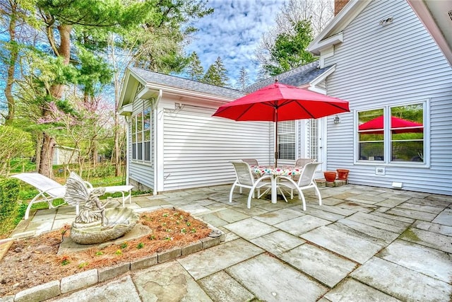 view of patio with outdoor dining area