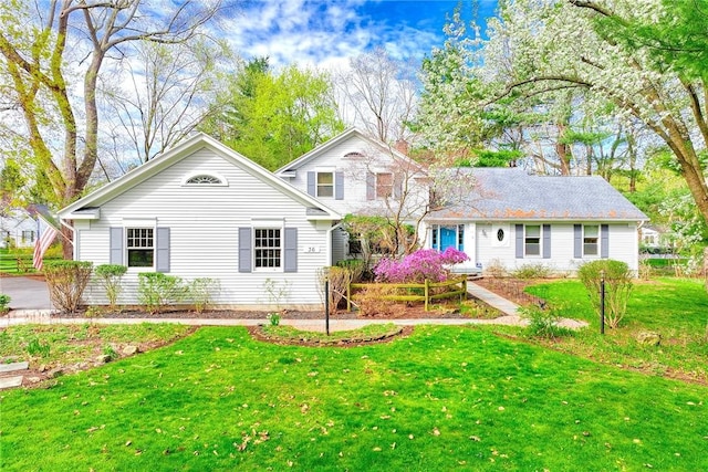 exterior space with a front lawn