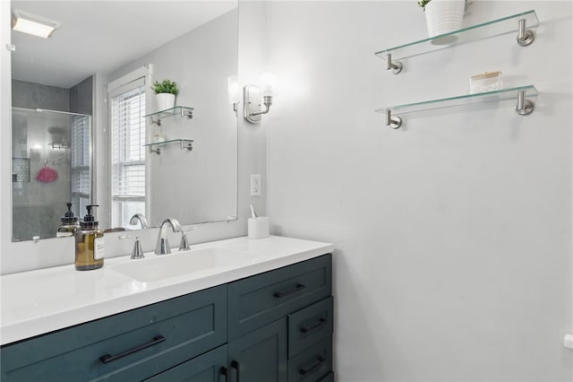 bathroom with an enclosed shower and vanity