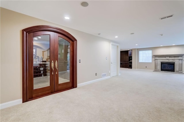 4 Windscape Park, Pittsford, NY 14534 - unfurnished living room with visible vents, baseboards, and light colored carpet
