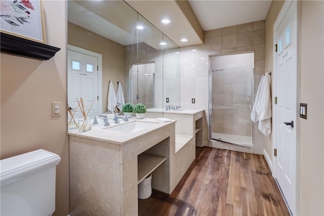 4 Windscape Park, Pittsford, NY 14534 - full bathroom featuring vanity, wood finished floors, toilet, recessed lighting, and a shower stall