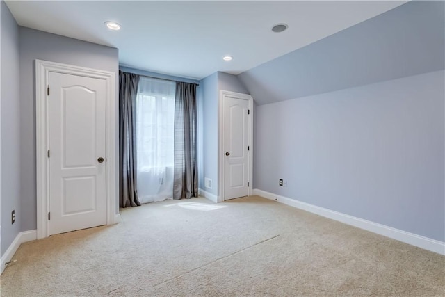 4 Windscape Park, Pittsford, NY 14534 - interior space with baseboards, vaulted ceiling, and light colored carpet
