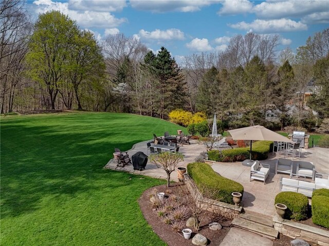 4 Windscape Park, Pittsford, NY 14534 - view of community with a patio and a yard