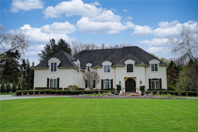 4 Windscape Park, Pittsford, NY 14534 - french country inspired facade with french doors, stucco siding, and a front lawn