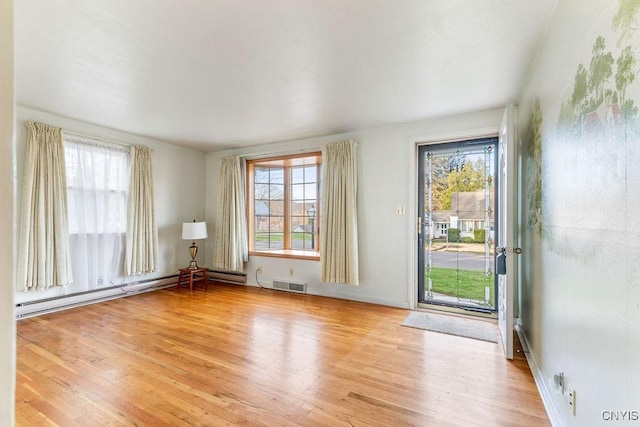 314 Westlind Rd, Geddes, NY 13219 - interior space with a wealth of natural light, wood finished floors, and visible vents