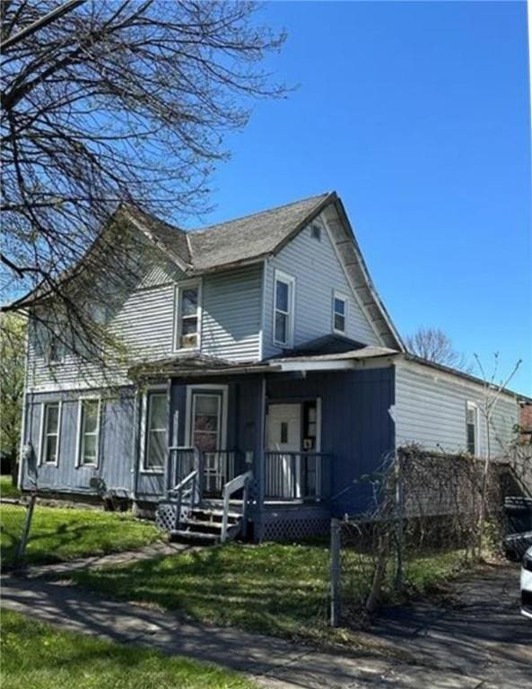 353 Division St, Elmira-City, NY 14901 - view of front of property with a front lawn and covered porch