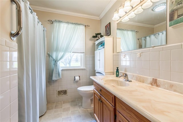 full bathroom featuring crown molding, tile patterned flooring, vanity, toilet, and tile walls