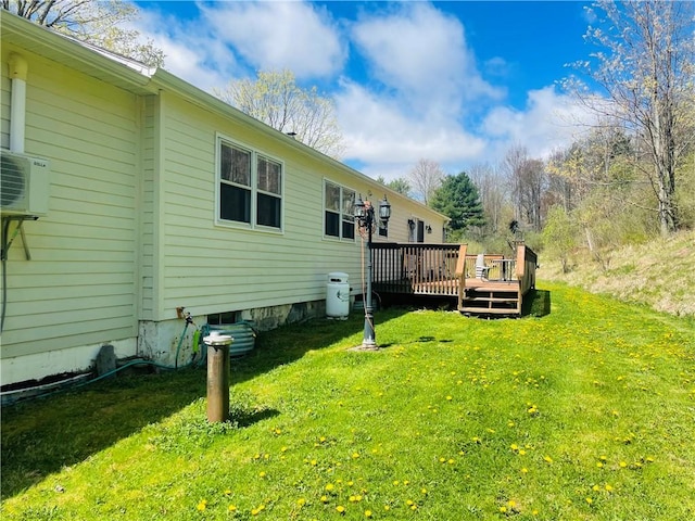 5291 Starr Rd, Thurston, NY 14821 - back of house featuring a wooden deck, ac unit, and a yard