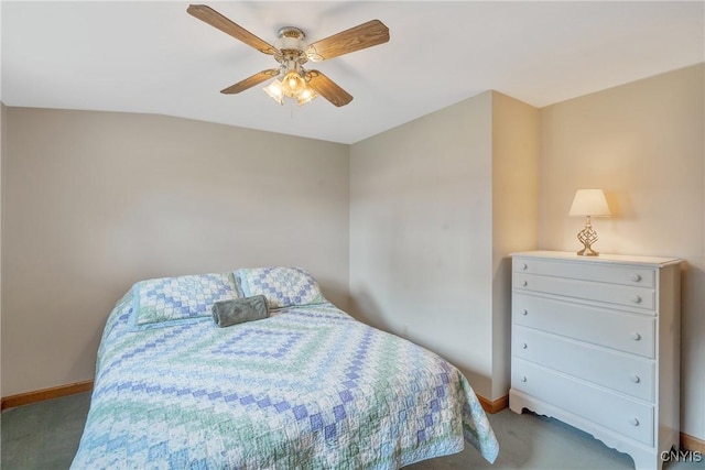 bedroom with baseboards, carpet flooring, and a ceiling fan
