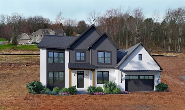 60 Colebare Way, Greece, NY 14616 - view of front facade featuring board and batten siding, a standing seam roof, metal roof, and a garage