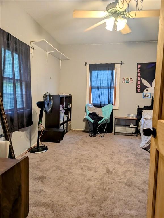 bedroom with carpet flooring and ceiling fan