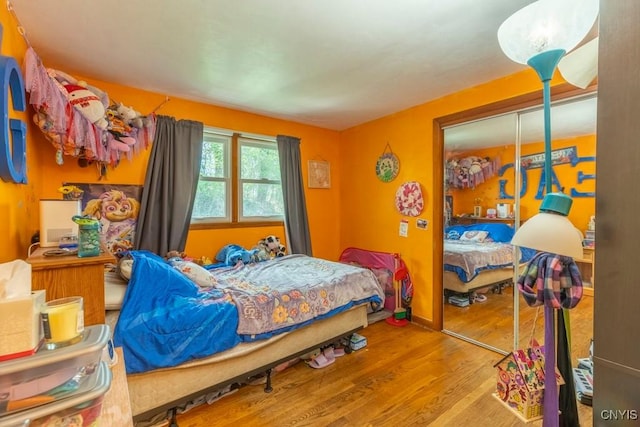 bedroom featuring wood finished floors