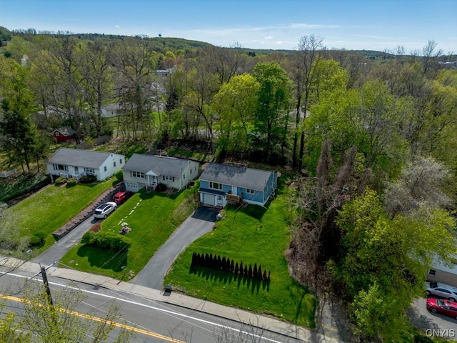 aerial view with a wooded view