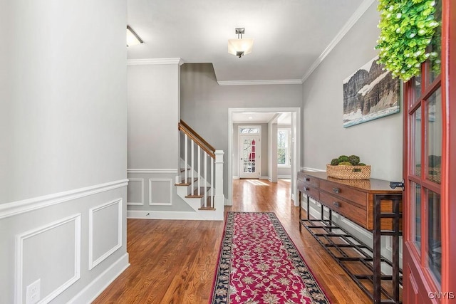 3830 Rippleton Rd, Cazenovia, NY 13035 - entrance foyer with crown molding, stairs, and wood finished floors