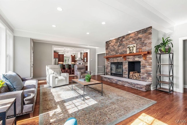 3830 Rippleton Rd, Cazenovia, NY 13035 - living area featuring a fireplace, wood finished floors, baseboards, ornamental molding, and recessed lighting